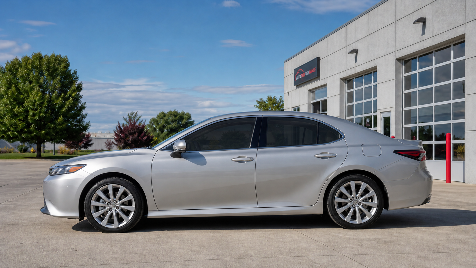 Silver four-door sedan with 15% window tint